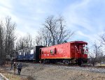 The Dover & Rockaway River RR TFT train heads away from the Route 46 Xing in Kenvil